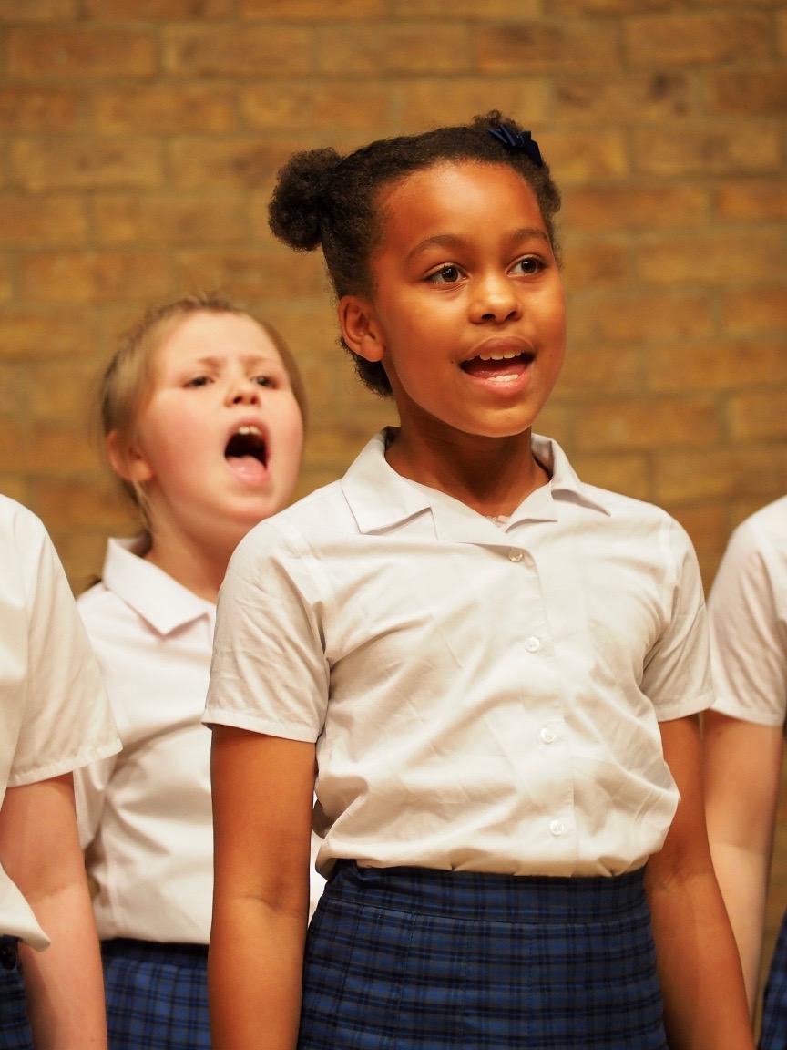 Junior School girl singing